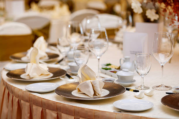 istock Elegant Banquet Table Setting with Glassware and Napkin Arrangement 2244622066