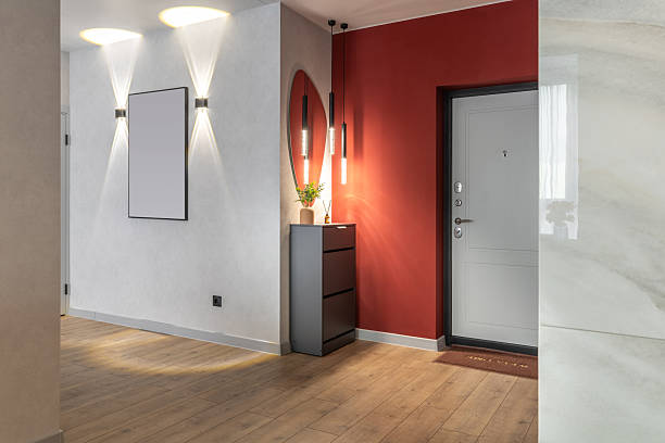 istock Stylish Apartment Hallway with Red Accent and Lighting 2244622404