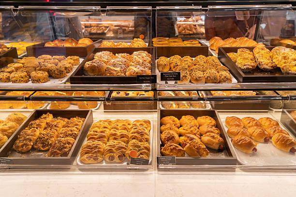 istock Assorted pastry and bread arranged on tray selling at bakery shop. 2244623975