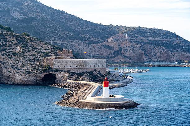 istock Lighthouse on Rocky Coastline in Cartagena 2244631514