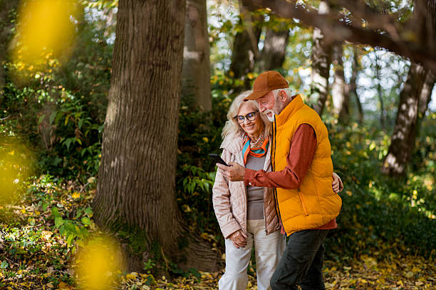 istock Senior couple look at smartphone together 2244640228