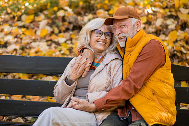 istock Retired couple laughing together outside 2244640265