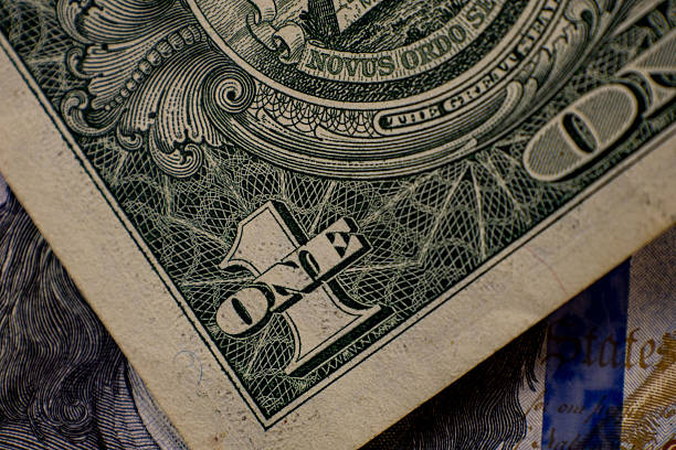 istock Close-up view of a one dollar bill featuring detailed design elements and currency textures in natural lighting 2244641580