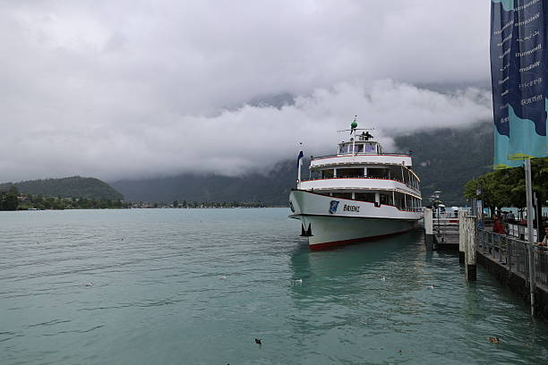Switzerland: - Lake Brienz is a lake on the edge of the Alps in the Bernese Oberland, nestled between the Emmental and Bernese Alps in the Swiss canton of Bern.