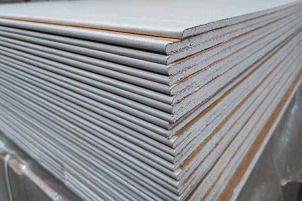 istock Construction materials stacked neatly in a warehouse waiting for use in building projects 2244645734