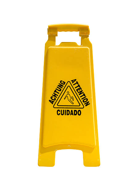 istock Wet floor warning sign, closeup. Isolated on white background 2244645964