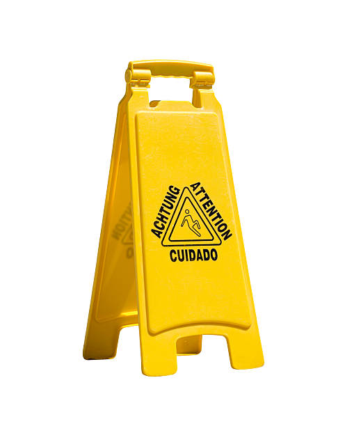 istock Wet floor warning sign, closeup. Isolated on white background 2244645966