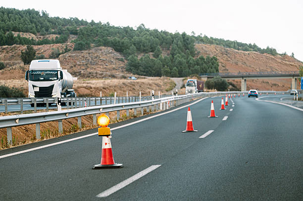 istock Highway lane closed with cones 2244653427