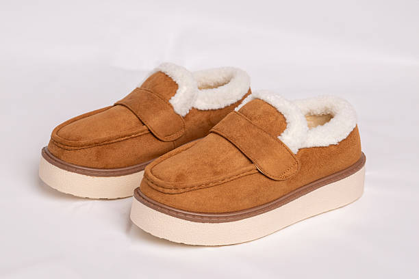 istock Warm shearling-lined loafers offering cozy winter comfort 2244655060