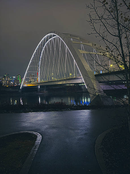 istock City Bridge over River at Night 2244660316