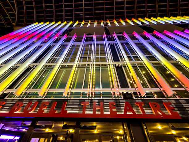 Looking up at front entrance at night with colorful lights. Downtown Denver, Colorado USA - October 28, 2025.