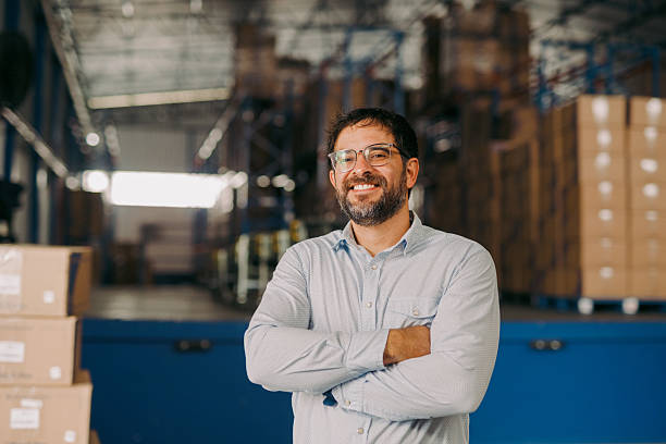 istock Confident entrepreneur standing in factory 2244662794