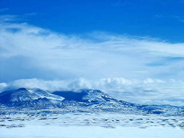 Low angle view of cumulus and cirrus clouds over Colorado. Taken near Fruita, Colorado.
