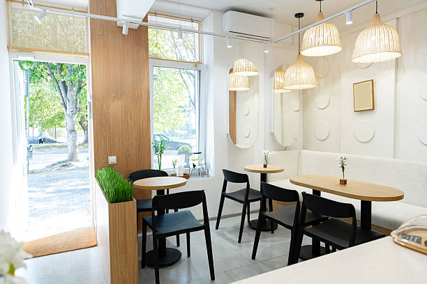 istock Modern cafe interior with natural light and simple decor in urban setting 2244666297