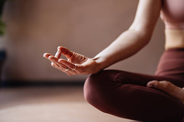 istock Calm Yoga Pose With Relaxed Hand and Balanced Posture in a Studio Setting 2244668501