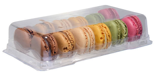 istock Set of colorful macaroons in transparent plastic packaging, isolated background 2244669116