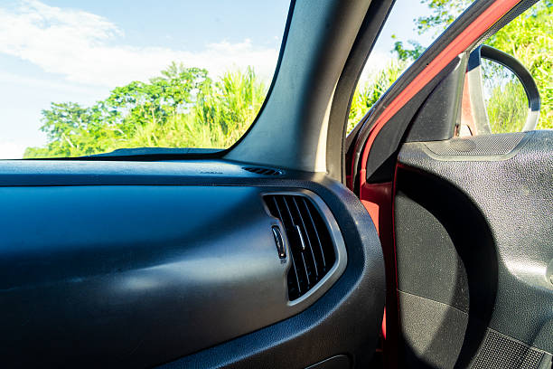 istock Driving a car with the door open 2244674370