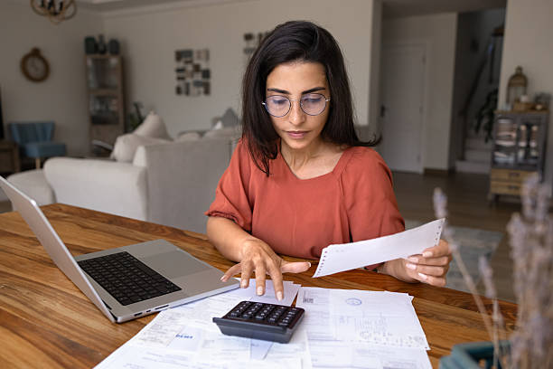 istock Focused young Latin freelance accountant working at home 2244677415