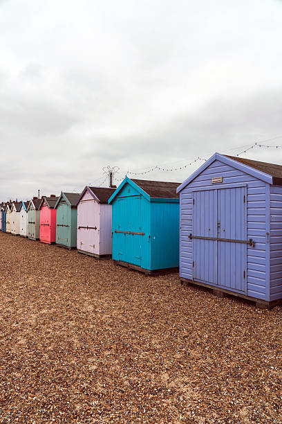 istock Colorful beach huts lining felixstowe shingle coastline 2244678689