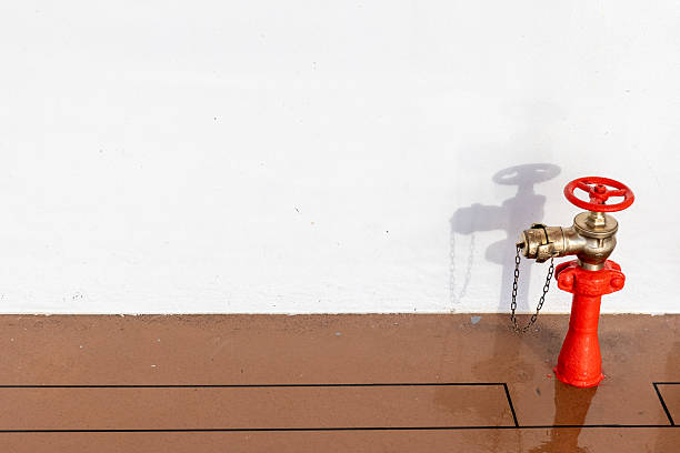 Red Fire Brigade Water Tap on Ship Deck  Fire Safety Equipment Background