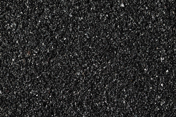 istock Extreme Close-Up of Black Sandpaper Surface Texture 2244681302