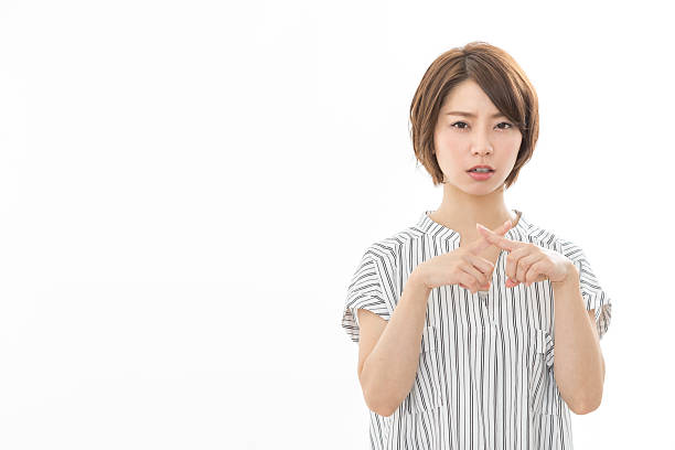 istock A woman giving an NG sign 2244682276