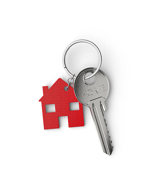 istock House key with red keychain on white background 2244682411