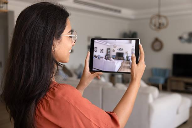 istock Landlady making virtual tour, video presentation for rent advertising 2244685334