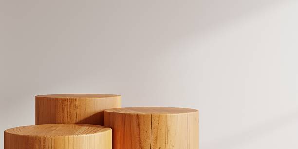 istock Minimal scene featuring round wooden podiums in a clean and neutral space, illuminated by soft natural light- 3D rendering 2244687770