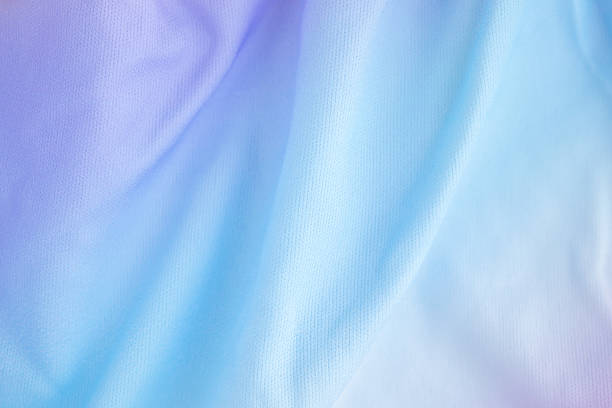 istock Abstract colorful rainbow color fabric soft wave smooth texture surface background 2244688010