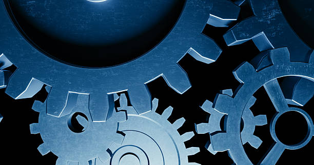 istock Complex mechanism of interlocking metal gears and cogs, technology and industry concept. 3d rendering 2244694711
