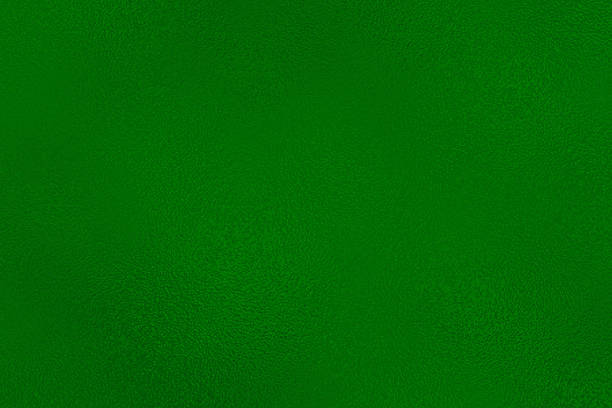 istock Dark Green metallic wall with scratched surface, abstract texture background. Abstract dark green glass background texture. 2244697482