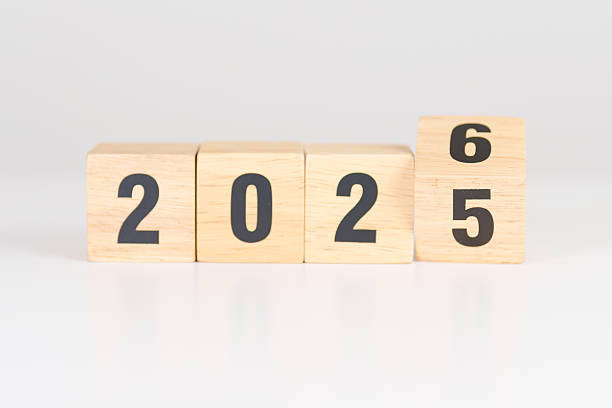 istock 2025 change to 2026 year block on table. goal, Resolution, strategy, plan, start, budget, mission, action, motivation and New Year concepts 2244700263