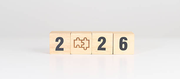 istock 2026 year block with jigsaw puzzle icon. Business Process, Team, teamwork, Goal, mission, Resolution, strategy, plan, Action, partnership, and New Year start 2244700267