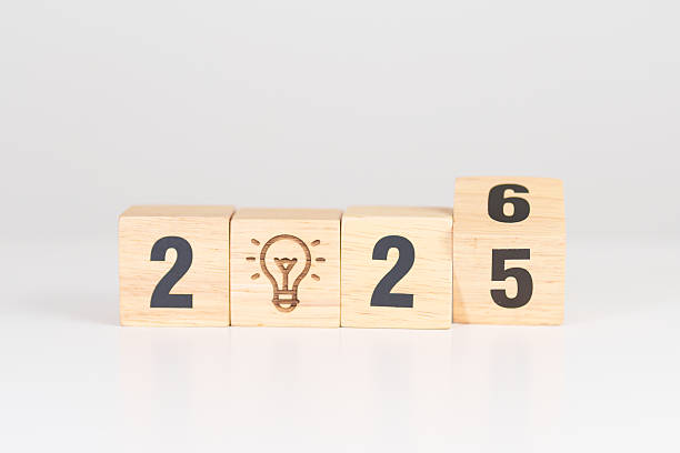 istock 2025 year change to 2026 year block with lightbulb. Business Idea, Creative, Thinking, brainstorm, Goal, Resolution, strategy, plan, Action, change and New Year start concepts 2244700270