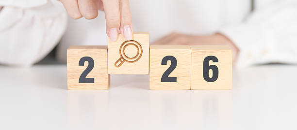 istock 2026 year block with magnifying glass icon. SEO, Search Engine Optimization, hiring , Advertising, Idea, Strategy, marketing, Keyword, Content and New Year start concepts 2244700445