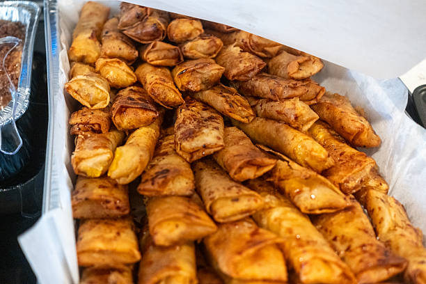 Delicious Filipino Turon served fresh at a local market on a sunny afternoon