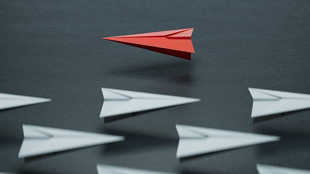 istock Different business concept.new ideas. paper art style. creative idea.Red and white paper plane. leader plane concept.3D rendering on black background. 2244700624