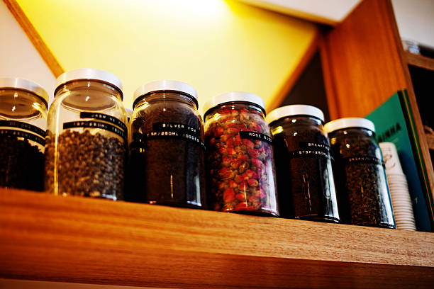 istock Assorted jars filled with various types of dried herbs and spices 2244702573