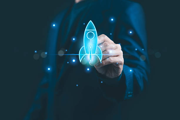 istock Businessman holding a virtual rocket icon symbolizing startup launch, innovation, business growth, digital transformation, and futuristic technology development in the modern entrepreneurial concept. 2244704276