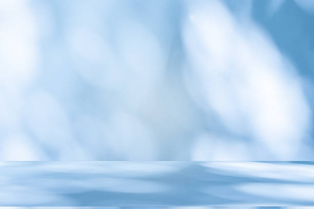 istock Studio style background wall decoration presentation uses white and blue tones. with shadows cast from a nearby window, concept creating a decorative 2244706045