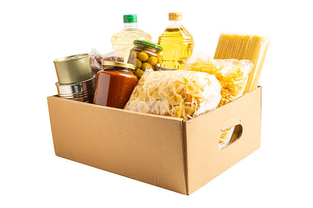 istock Foodstuffs in donation box isolated on white background with clipping path. 2244710664
