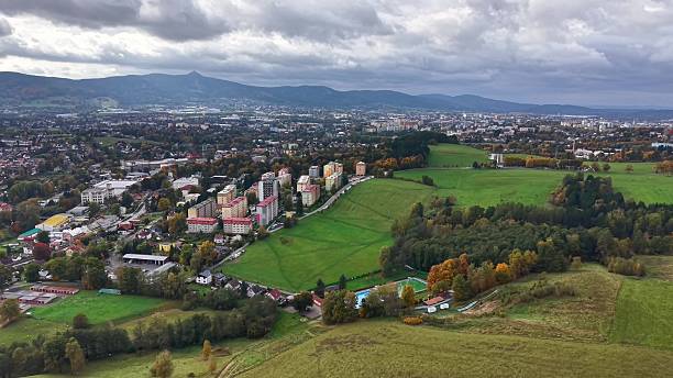 istock expansive land with peaceful peaks, distant summits overlooking vibrant verdant countryside below 2244711641