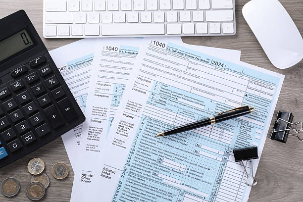 istock Tax accounting. Flat lay composition with calculator and documents on wooden table 2244713684