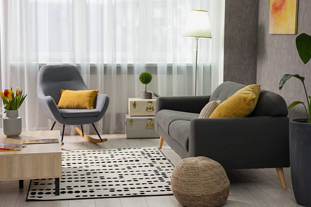 Home renovation. Room interior with stylish gray wallpaper on wall