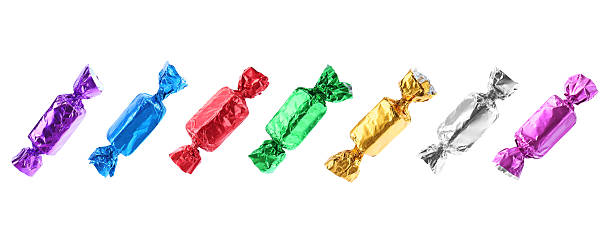 istock Tasty candies in bright wrappers isolated on white, set 2244718318