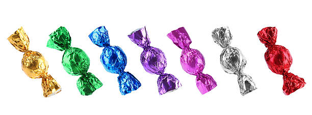 istock Tasty candies in bright wrappers isolated on white, set 2244718384