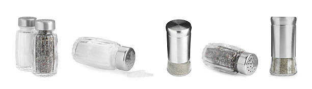 istock Different salt and pepper shakers isolated on white, set 2244719679