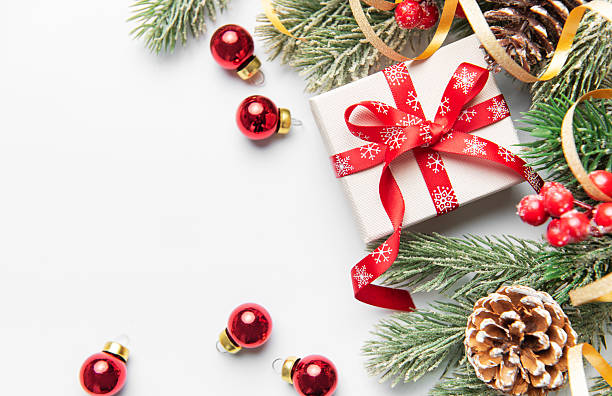 istock Christmas giftbox with pine branches and ornaments 2244720178