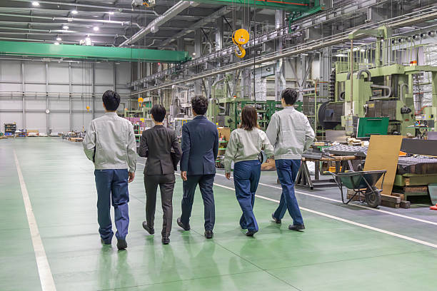 Group of Asian people working in a factory